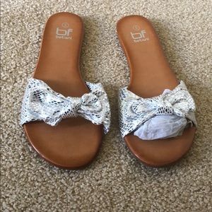 Silver bow sandals